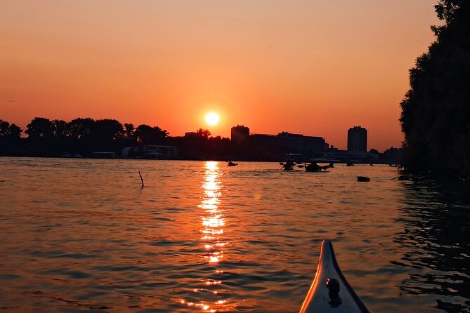 Belgrade sunset kayak tour - Paddling past Zemunski kej